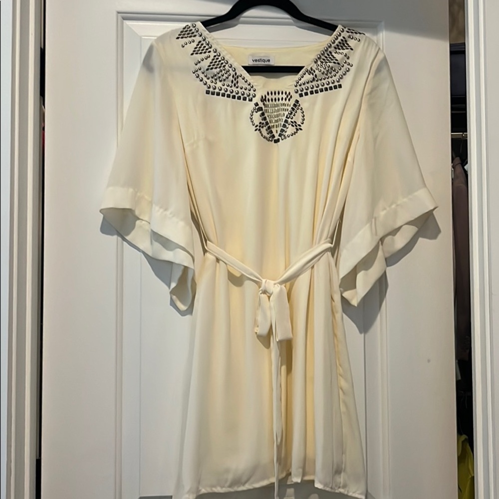 Cream bell sleeve with beaded neck detail